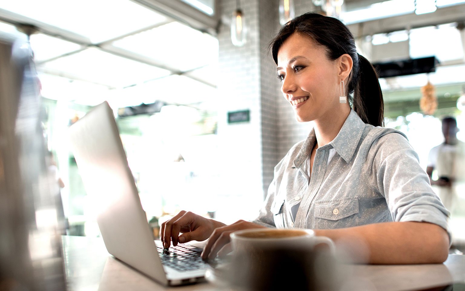 woman typing on computer