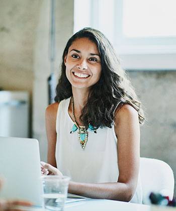 Digital Invoice Management woman working on laptop